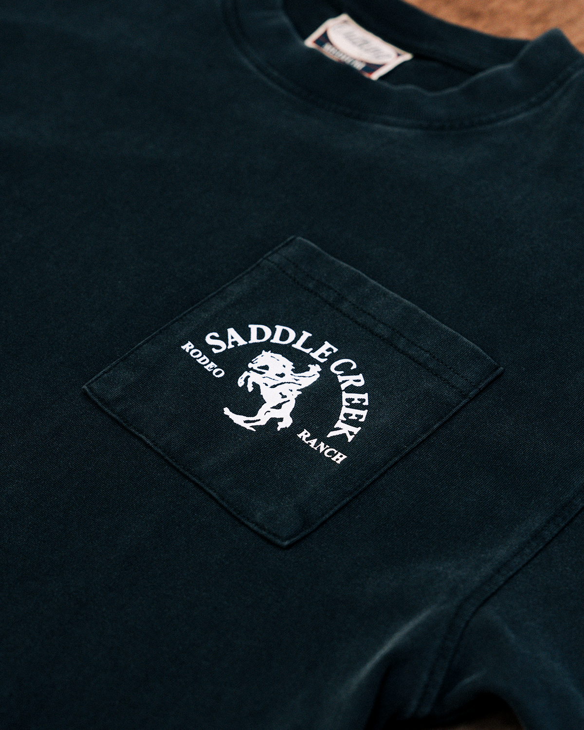 The Saddle Creek Pocket Tee